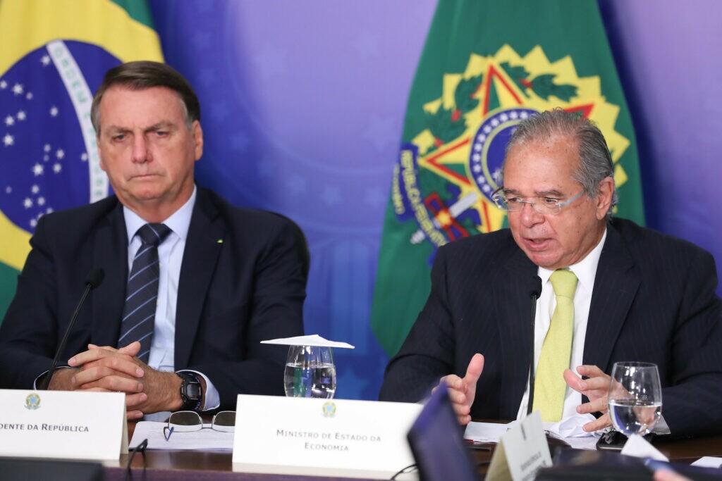 Presidente Jair Bolsonaro e Paulo Guedes durante conferência promovida pelo banco Credit Suisse