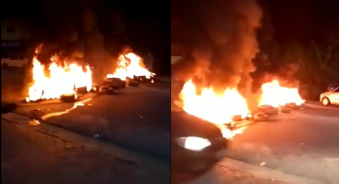 Moradores de Ubatuba ateiam fogo em pneus para impedir entrada de turistas