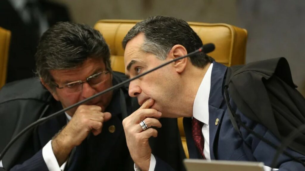 Luiz Fux, presidente do STF, e Luís Roberto Barroso, presidente do TSE