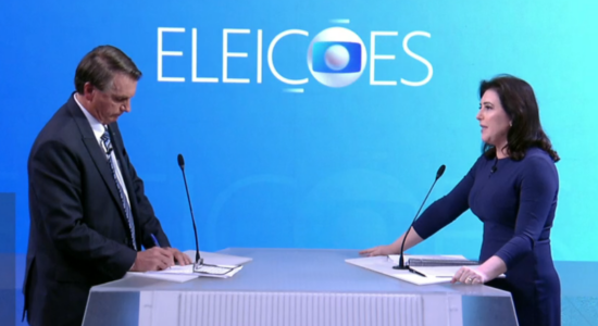 Candidatos Jair Bolsonaro e Simone Tebet